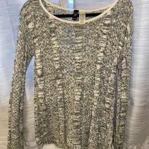 Gray sweater with open heart on back